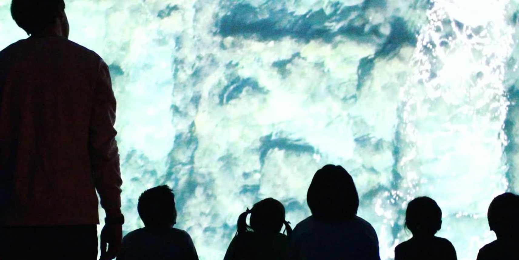 Teacher in museum with students