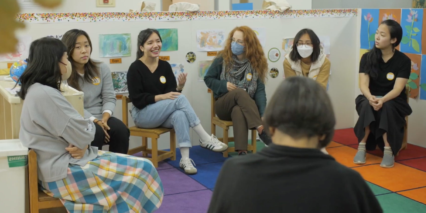 Teachers conversing in a group