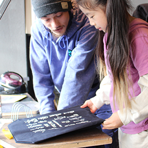 Student screen printing with local artist